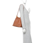Grained Calfskin Low Key Hobo PM Cognac