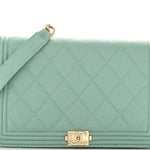 Caviar Quilted Boy Wallet On Chain WOC Light Blue