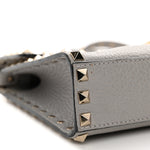 Pebbled Calfskin Medium Rockstud Flip Lock Crossbody Bag Pastel Grey