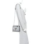 Calfskin Monogram Spaceship Embossed Twist Shoulder Bag PM Argent