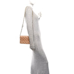 Lambskin Embossed Monogram Pochette Coussin Camel