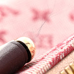 Mini Monogram Alma Long Cherry