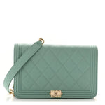 Caviar Quilted Boy Wallet On Chain WOC Light Blue