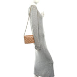 Lambskin Embossed Monogram Pochette Coussin Camel
