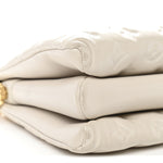 Lambskin Embossed Monogram Coussin PM Beige Cream