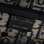 Oblique Embroidered Saddle Bag Blue