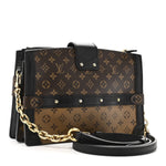 Reverse Monogram Trunk Clutch