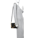Lambskin Embossed Monogram Pochette Coussin Camel