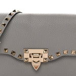 Pebbled Calfskin Medium Rockstud Flip Lock Crossbody Bag Pastel Grey