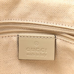 Monogram Margaux Calfskin Medium Sukey Top Handle Bag Beige Ebony Mystic White