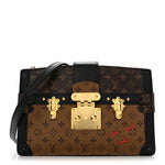 Reverse Monogram Trunk Clutch