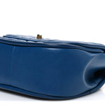 Lambskin Reverse Chevron Quilted Mini Round Top Handle Flap Blue