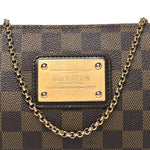 Damier Ebene Eva Clutch