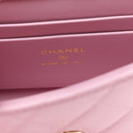 Caviar Quilted Coco Handle Clutch With Chain Pink