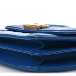 Calfskin Quilted North South Boy Flap Blue