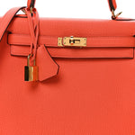 Togo Kelly Retourne 25 Orange Poppy