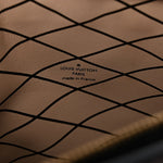 Reverse Monogram Trunk Clutch