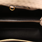 Taurillon Snakeskin Capucines PM Galet