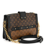Reverse Monogram Trunk Clutch