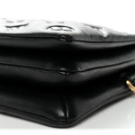 Lambskin Embossed Monogram Pochette Coussin Black