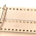 Pebbled Calfskin Rockstud Side Slip Crossbody Ivory