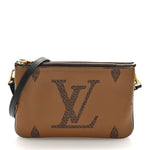 Reverse Monogram Giant Double Zip Pochette
