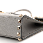 Pebbled Calfskin Medium Rockstud Flip Lock Crossbody Bag Pastel Grey