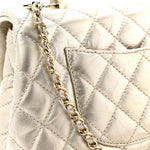 Metallic Aged Calfskin Quilted Mini Coco Handle Flap Gold