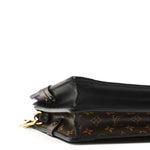 Reverse Monogram Trunk Clutch