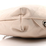 Shiny Calfskin Quilted Chanel 22 Backpack Beige