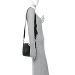 Pebbled Calfskin Mini Rockstud Flip-Lock Messenger Bag Black
