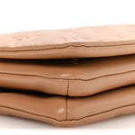 Lambskin Embossed Monogram Pochette Coussin Camel