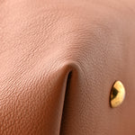 Grained Calfskin Low Key Hobo MM Cognac