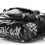 Agneau Arena Graffiti All Over Mini Explorer Crossbody Backpack  Black White