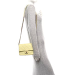 Shiny Caviar Quilted Mini Chain Messenger Flap Bag Yellow