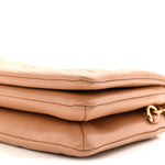 Lambskin Embossed Monogram Pochette Coussin Camel