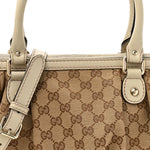 Monogram Margaux Calfskin Medium Sukey Top Handle Bag Beige Ebony Mystic White