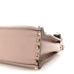 Pebbled Calfskin Medium Rockstud Top Handle Shoulder Bag Poudre
