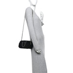 Shearling Quilted Barrel Clutch With Chain Black