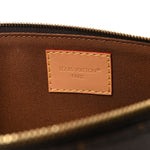 Monogram Eva Clutch NM