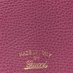 Dollar Calfskin Mini Swing Wallet Bag Purple
