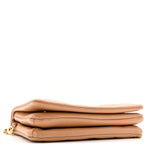 Lambskin Embossed Monogram Pochette Coussin Camel