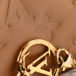 Lambskin Embossed Monogram Pochette Coussin Camel