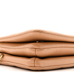Lambskin Embossed Monogram Pochette Coussin Camel