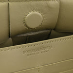 Calfskin Maxi Intrecciato Cassette Pouch On Strap Travertine