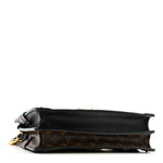 Reverse Monogram Trunk Clutch