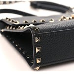 Pebbled Calfskin Medium Rockstud Flip Lock Crossbody Bag Black