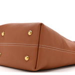 Grained Calfskin Low Key Hobo PM Cognac