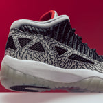 Air Jordan 11 Retro Low IE "Black Cement" - Black/Fire Red