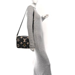 Empreinte Monogram Giant Pochette Metis Black Beige